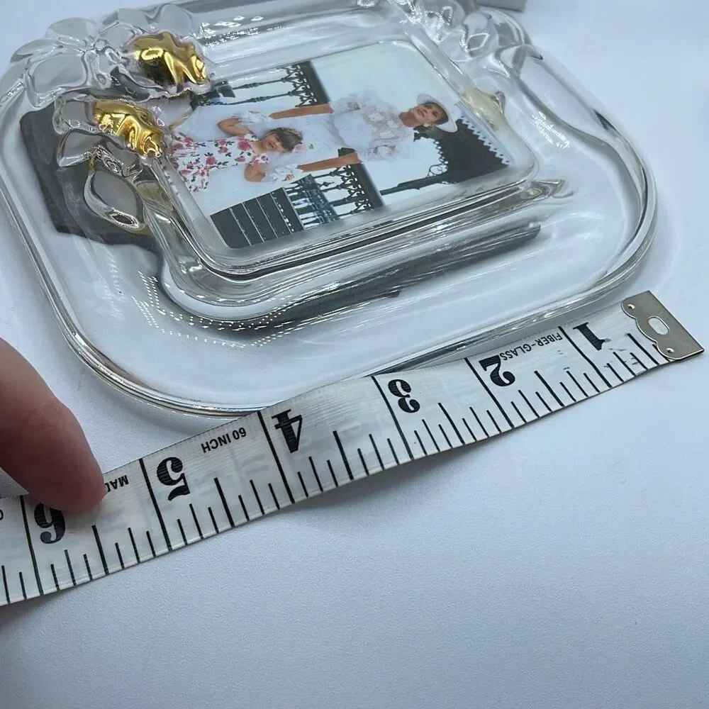 Fifth Avenue Crystal picture frame. Picture size 2.5” x 3.5”